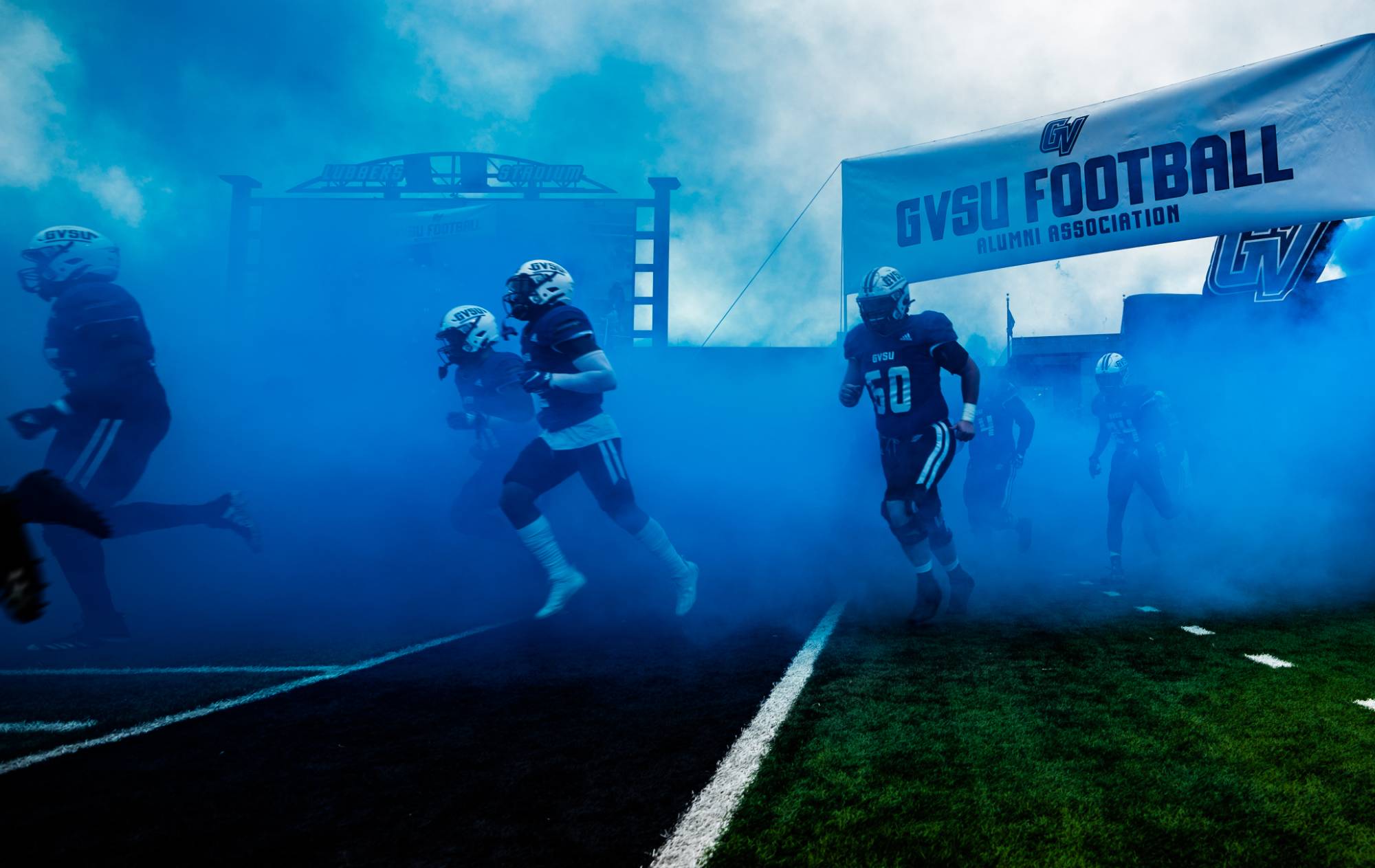 Football players taking the field